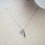 Pale Alice Blue Glass With Feather Pendant..