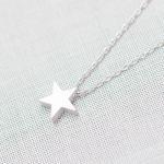 Tiny Star Pendant Necklace in silve..