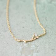 Branch with Crystal necklace in gold