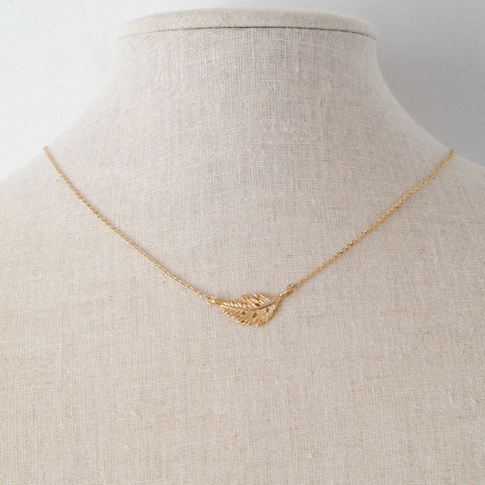 Tiny Feather Necklace In Gold on Luulla